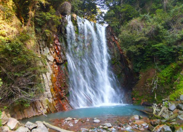 Maruo Falls, a rare hot spring waterfall in Kirishima with milky emerald water